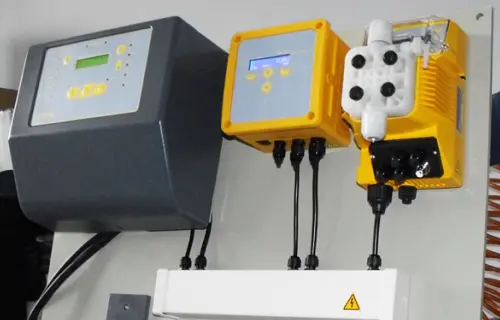 An image of 3 controllers or automation systems or pumps for a swimming pool automation system.